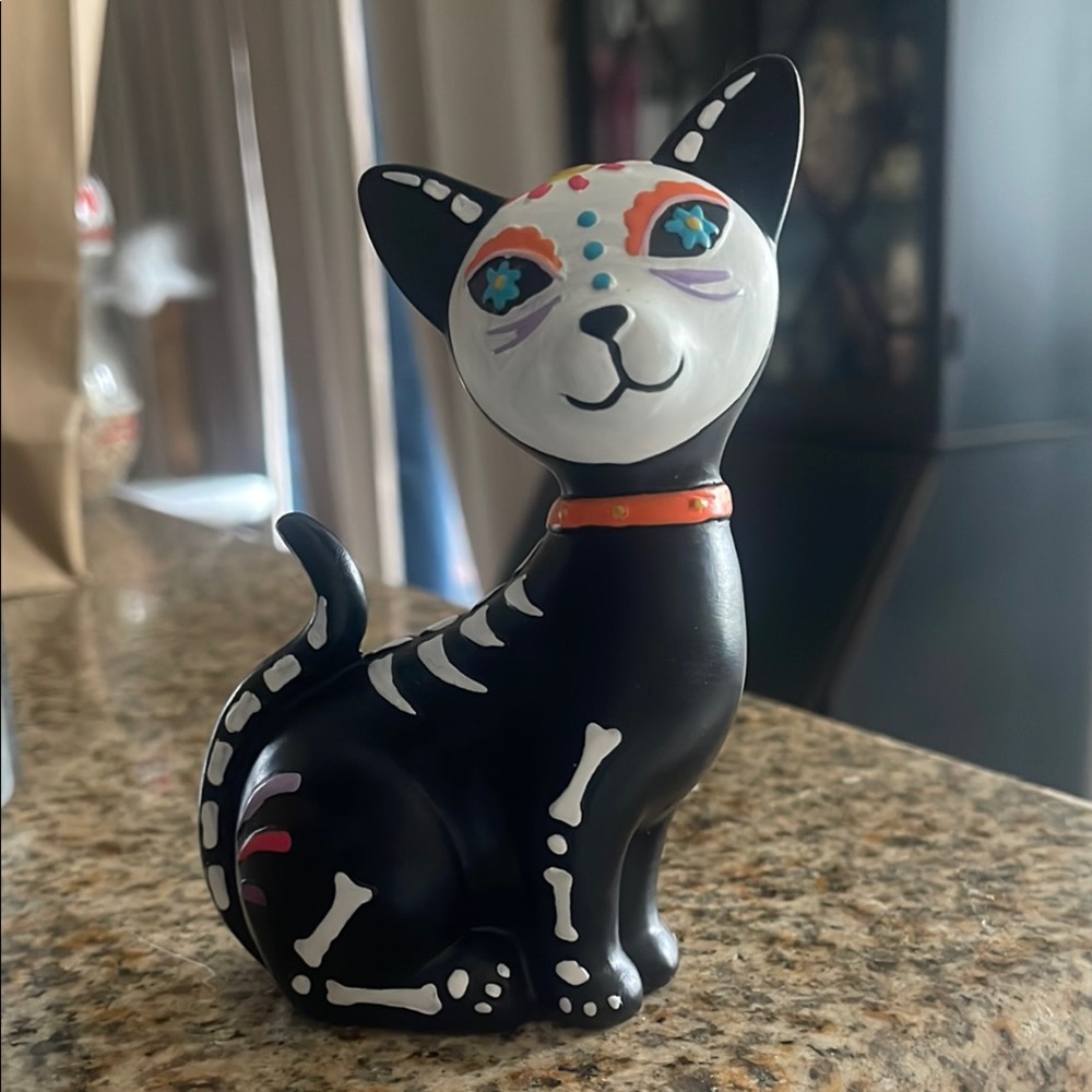 Black Decorative Cat Figurine with White Skeleton Accents